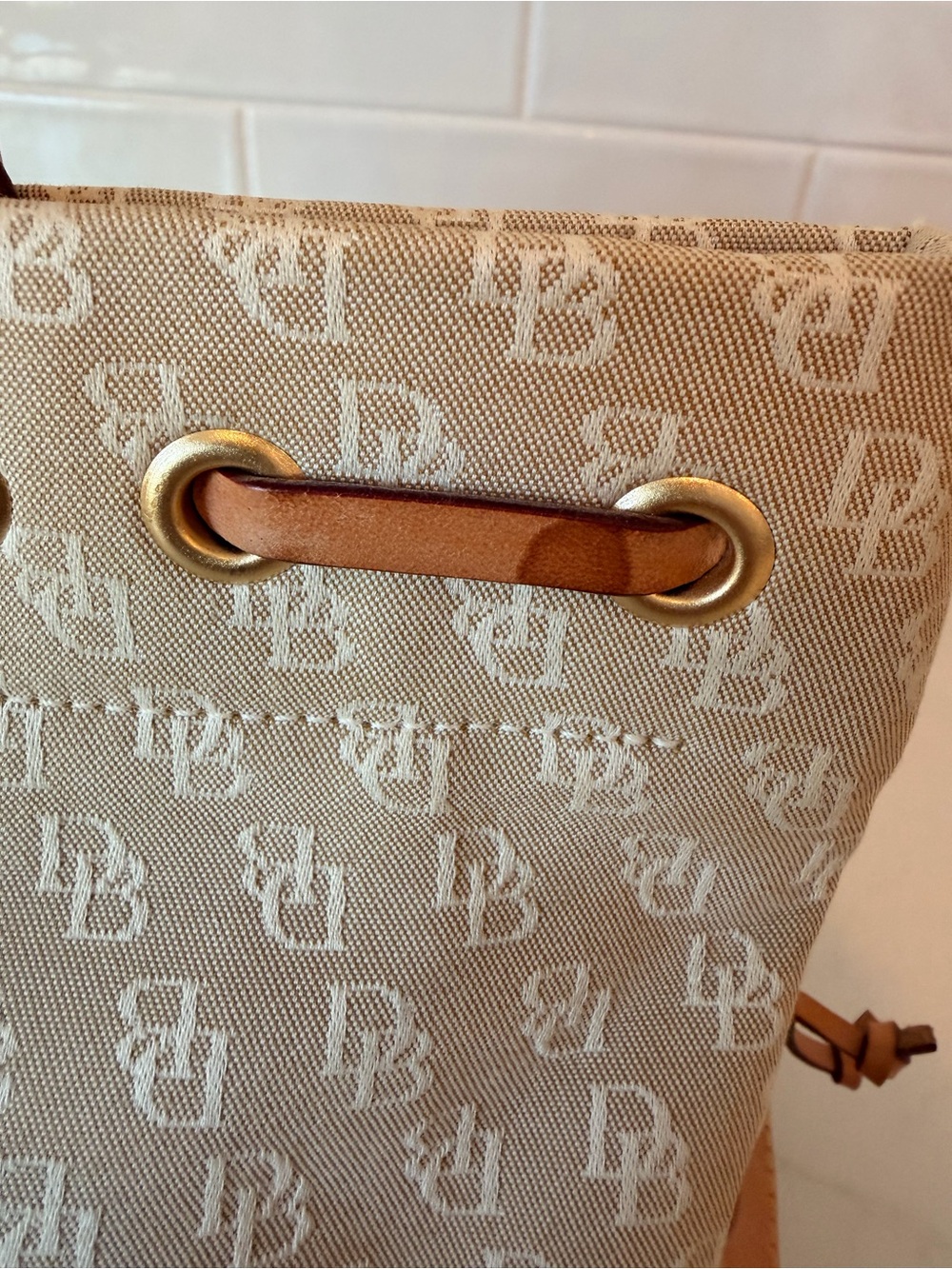 Dooney & Bourke tassel tote with brown leather handles - Picture 7 of 12